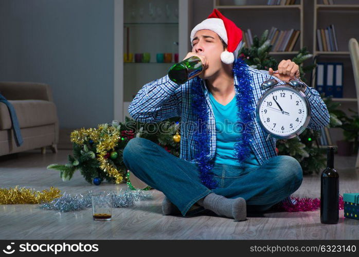 Man celebrating christmas at home alone