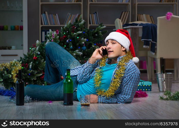 Man celebrating christmas at home alone