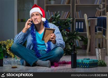 Man celebrating christmas at home alone