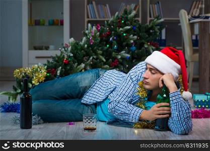 Man celebrating christmas at home alone. The man celebrating christmas at home alone