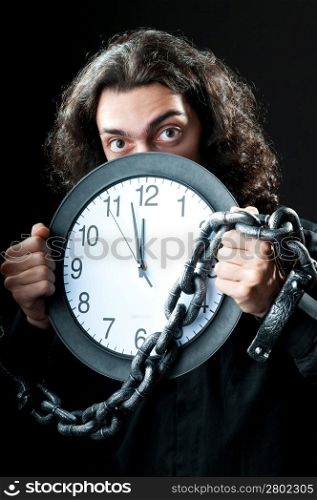 Man chained to the clock