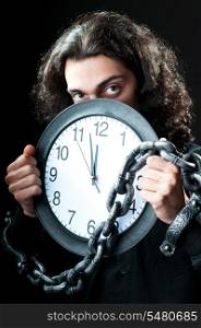 Man chained to the clock