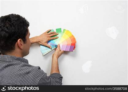 Man Choosing Paint Color