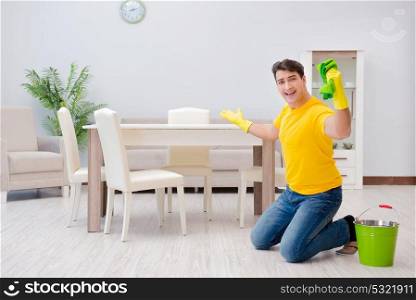 Man cleaning the house helping his wife