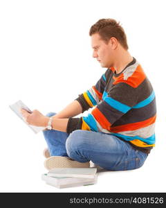 Man college student sitting and reading book studying for exam isolated. Studio shot.