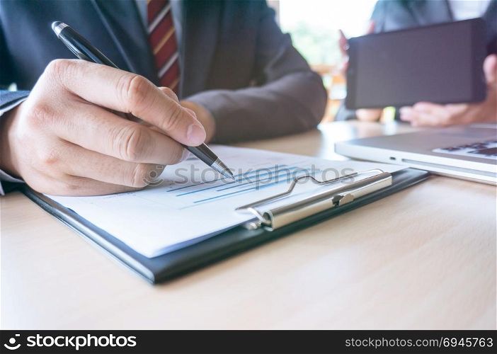 Man Completing Application Form during job interview. human resources concept