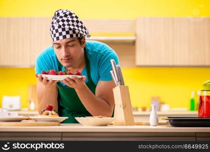 Man cook preparing cake in kitchen at home