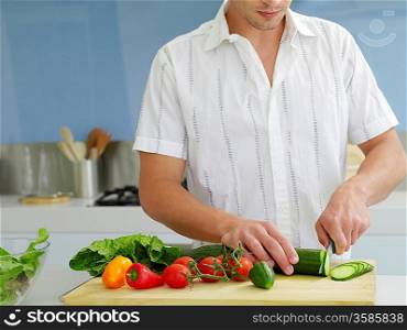 Man Cooking in Kitchen