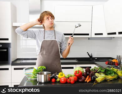 Man cooking in modern kitchen