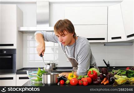 Man cooking in modern kitchen
