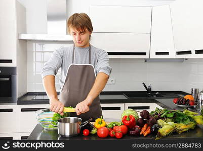 Man cooking in modern kitchen