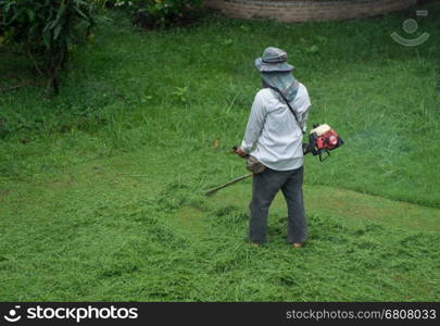 man cutting grass with a lawn mower&#xA;