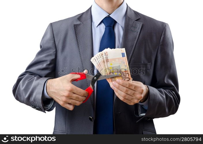 Man cutting money on white