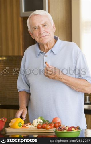 Man Cutting Up Vegetables