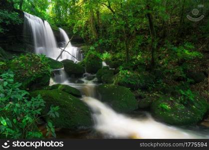 Man Daeng waterfall, Waterfall with autumn color change Beautiful nature.. Man Daeng waterfall.