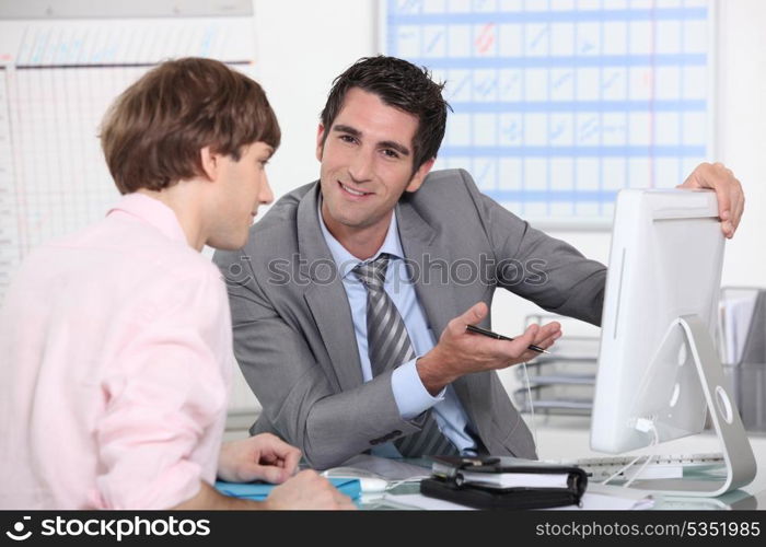 Man demonstrating a computer