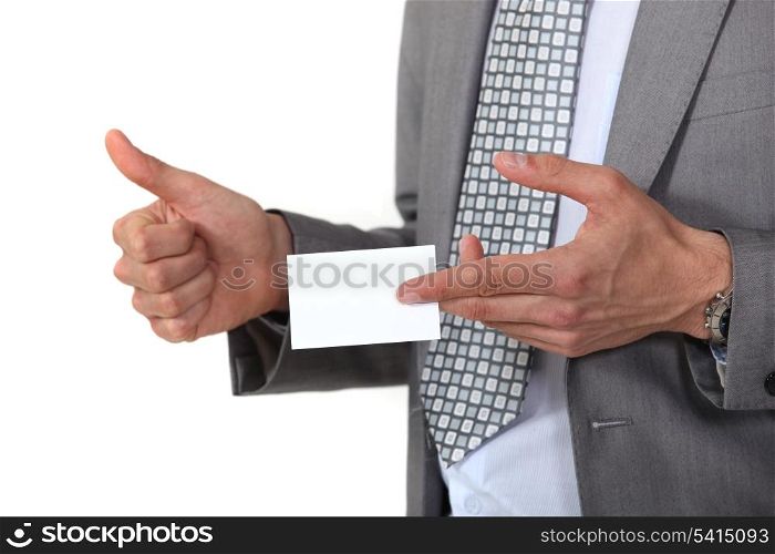 Man displaying business card