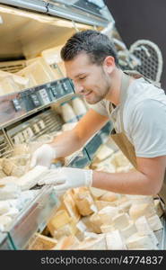 man displaying cheese