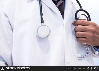 Man doctor with a black stethoscope