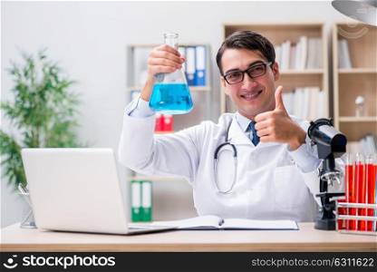 Man doctor working in the lab