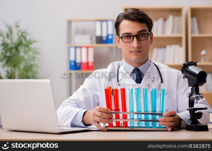 Man doctor working in the lab