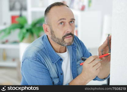 man doing diy at home