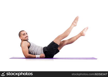 Man doing exercises on white