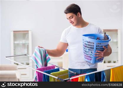 Man doing laundry at home