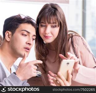 Man doing make-up for cute woman in beauty salon. The man doing make-up for cute woman in beauty salon