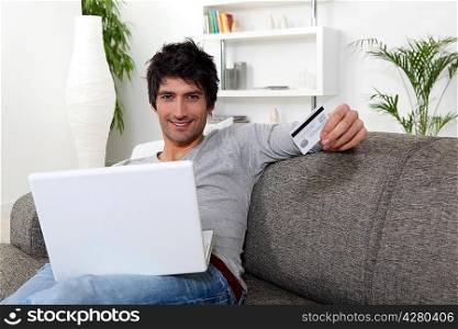 Man doing shopping on the Internet