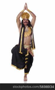 Man dressed as Raavan in yoga pose