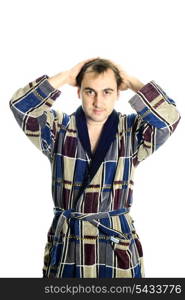 Man dressing blue bathrobe and hands up isolated on white background