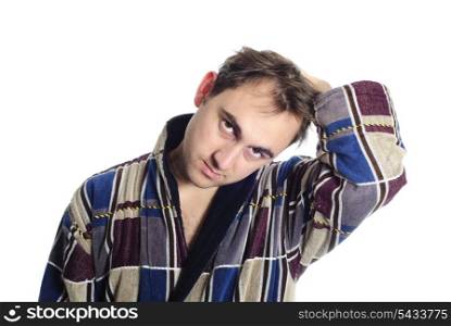 Man dressing blue bathrobe isolated on white background. He is frustrated and hand up.