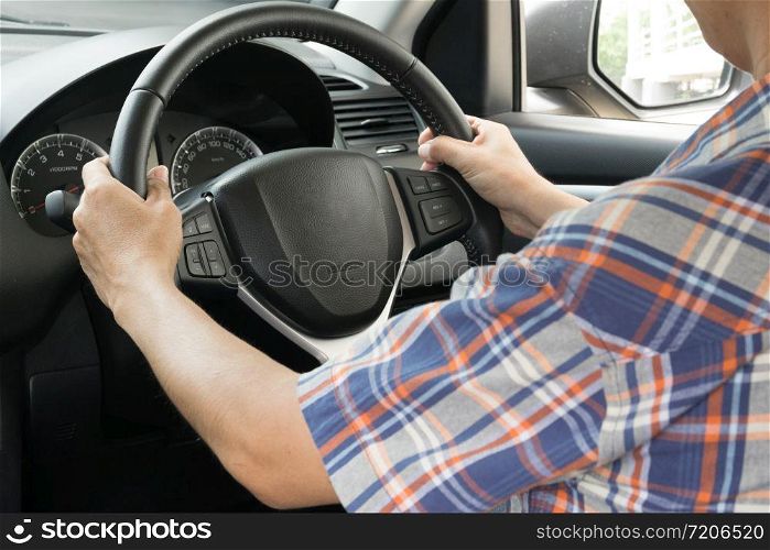 Man driving a car