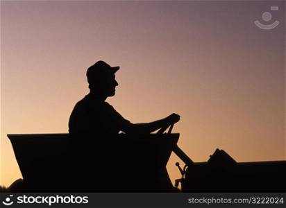 Man Driving a Tractor
