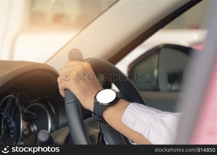 man driving car on blurred background in city. Using wallpaper for transport, automotive automobile and car for travel advertising image.