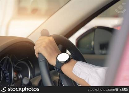 man driving car on blurred background in city. Using wallpaper for transport, automotive automobile and car for travel advertising image.