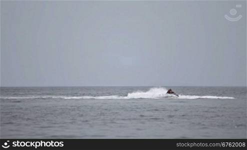 Man driving jetski in the sea