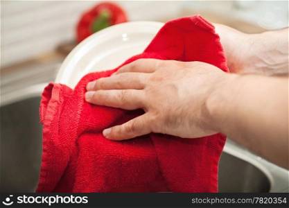 man drying the dishes