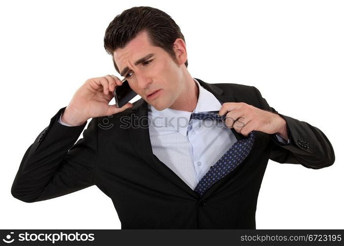 Man eager to end a telephone conversation