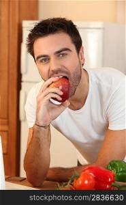 Man eating an apple