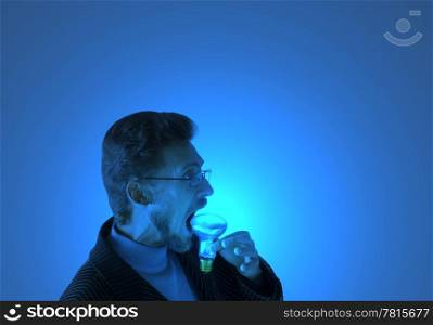 Man eating an electric lamp