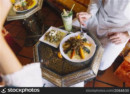 man eating arab restaurant