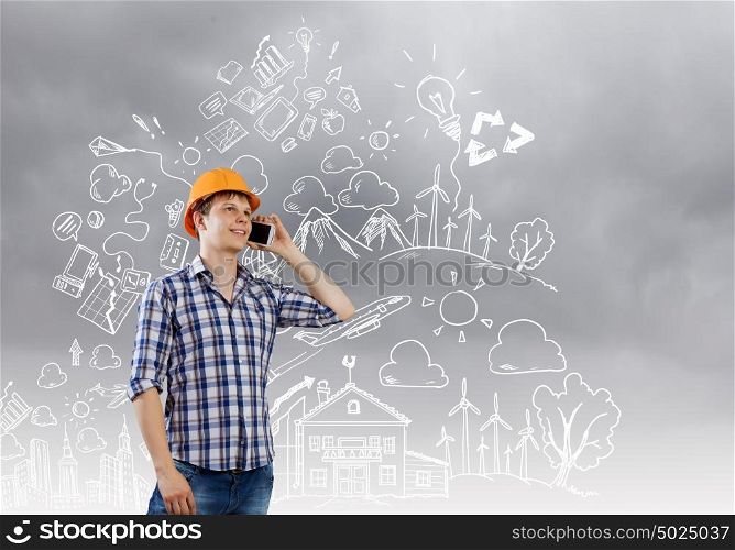 Man engineer. Image of man engineer talking on mobile phone