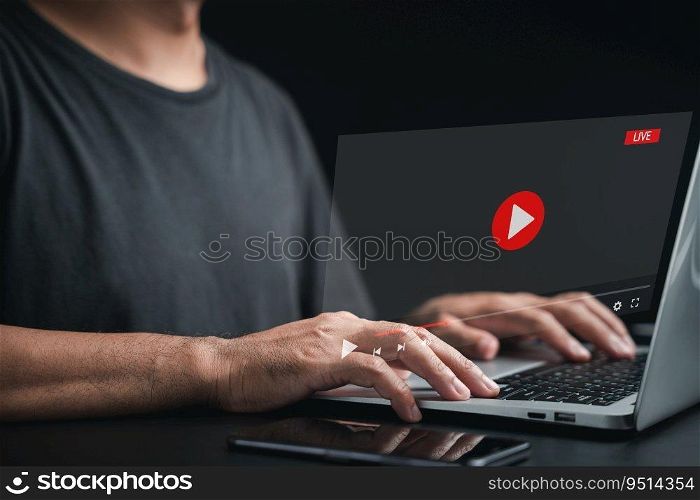 Man engrossed in watching a live stream on the internet. Online video streaming window on the computer screen. Embrace the digital era of entertainment and information.