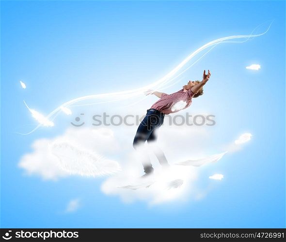 Man evades light. Young guy in casual evading from light rays