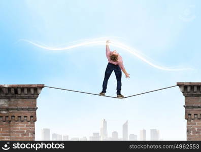 Man evades light. Young guy in casual evading from light rays