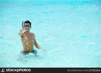 man excited with thumbs up for snorkeling adventure in Maldives