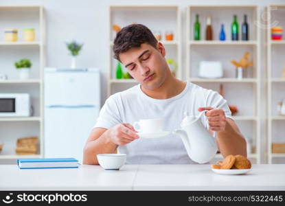 Man falling asleep during his breakfast after overtime work