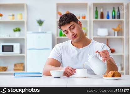 Man falling asleep during his breakfast after overtime work